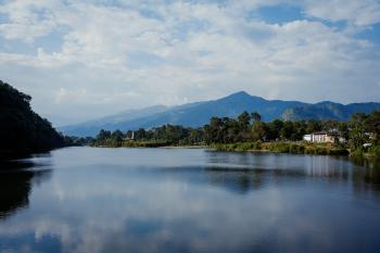 A colour photo of the view accross the lake, Pokhara, Nepal, 2009.