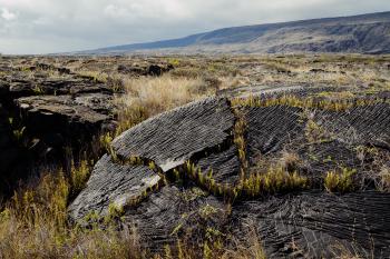 Patterns in the lava in the barren landscape at Holei sea arches